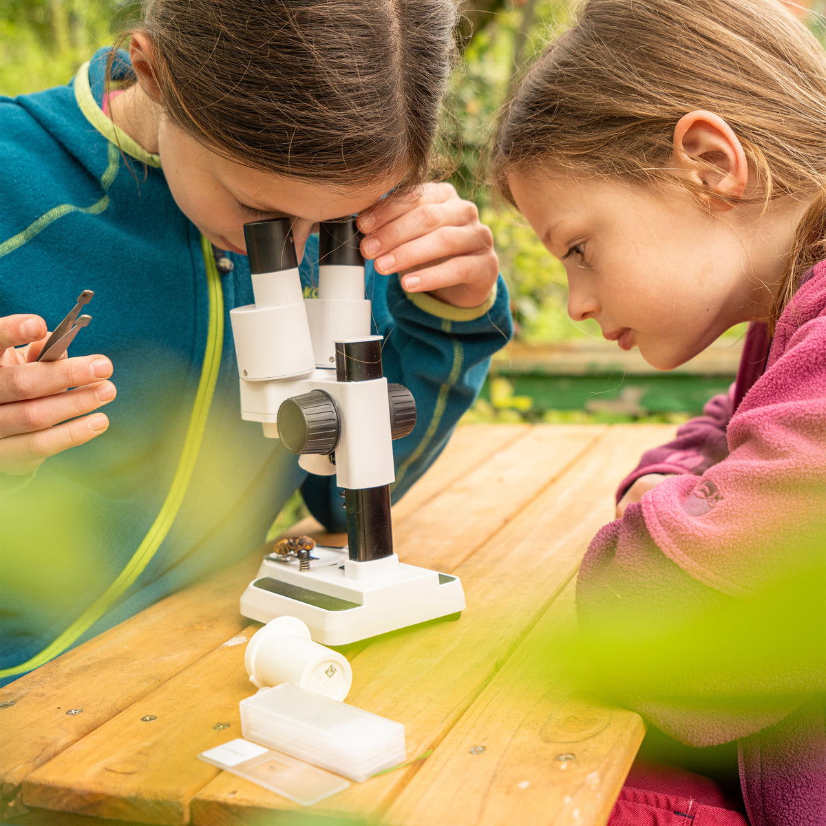 BRESSER JUNIOR Transmitted and Incident Light Microscope with 20x and 50x Magnification